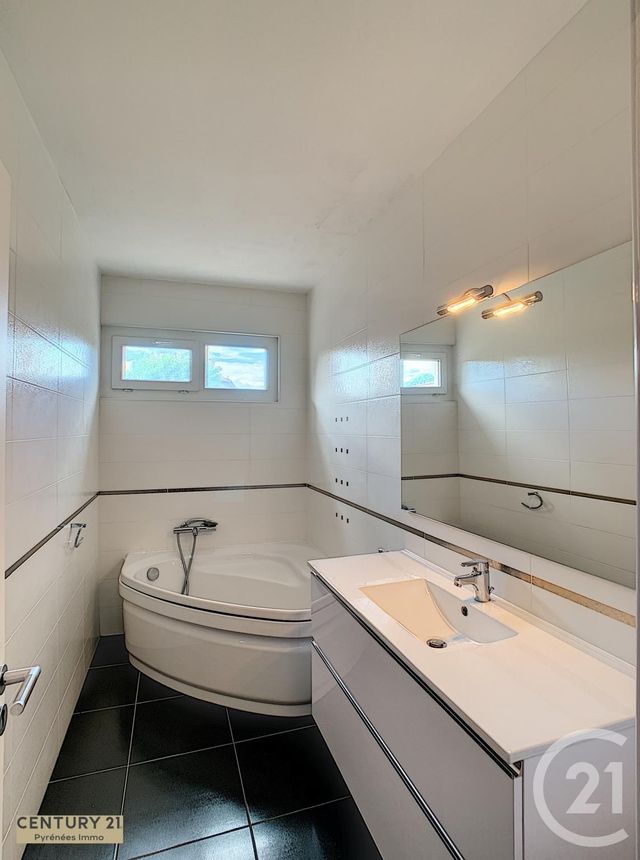 Afficher la photo en grand Appartement F4 à vendre - 4 pièces - 107.5 m2 - ST GAUDENS - 31 - MIDI-PYRENEES - Century 21 Pyrénées Immo