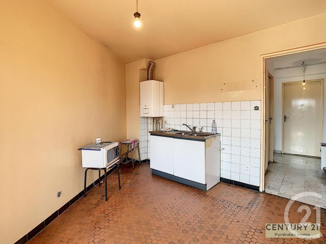 Afficher la photo en grand Appartement T4 à vendre - 4 pièces - 79.89 m2 - ST GAUDENS - 31 - MIDI-PYRENEES - Century 21 Pyrénées Immo
