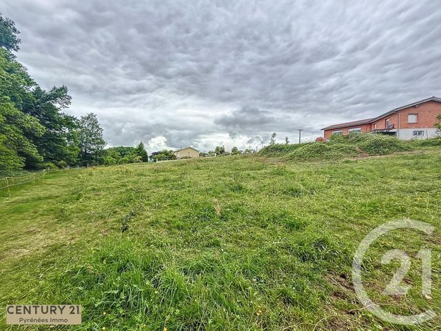 Afficher la photo en grand terrain à vendre - 2030.0 m2 - CUGURON - 31 - MIDI-PYRENEES - Century 21 Pyrénées Immo