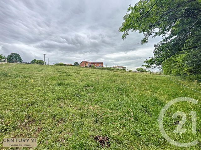 Afficher la photo en grand terrain à vendre - 2030.0 m2 - CUGURON - 31 - MIDI-PYRENEES - Century 21 Pyrénées Immo