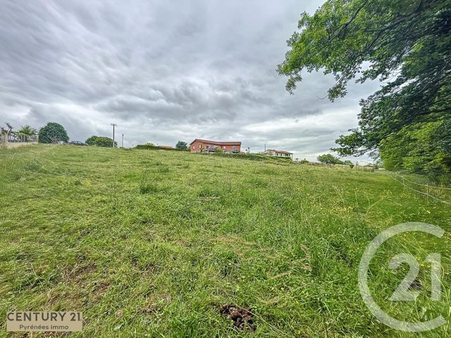 Afficher la photo en grand terrain à vendre - 2030.0 m2 - CUGURON - 31 - MIDI-PYRENEES - Century 21 Pyrénées Immo