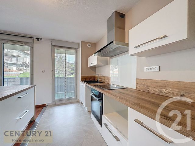 Appartement T3 à louer - 3 pièces - 61.43 m2 - ST GAUDENS - 31 - MIDI-PYRENEES - Century 21 Pyrénées Immo