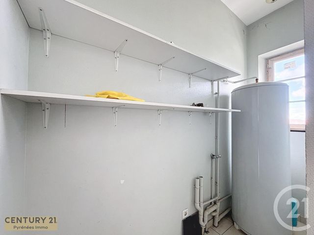 Afficher la photo en grand Appartement T4 à louer - 4 pièces - 76.41 m2 - BOULOGNE SUR GESSE - 31 - MIDI-PYRENEES - Century 21 Pyrénées Immo