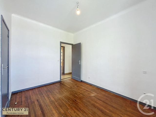 Afficher la photo en grand Appartement T4 à louer - 4 pièces - 76.41 m2 - BOULOGNE SUR GESSE - 31 - MIDI-PYRENEES - Century 21 Pyrénées Immo