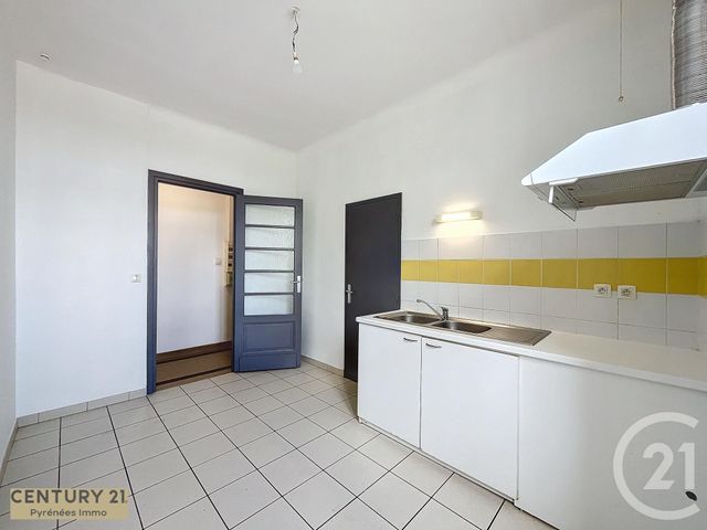 Afficher la photo en grand Appartement T4 à louer - 4 pièces - 76.41 m2 - BOULOGNE SUR GESSE - 31 - MIDI-PYRENEES - Century 21 Pyrénées Immo