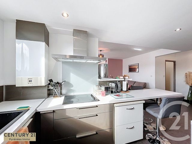 Afficher la photo en grand Appartement F3 à vendre - 3 pièces - 82.0 m2 - ST GAUDENS - 31 - MIDI-PYRENEES - Century 21 Pyrénées Immo