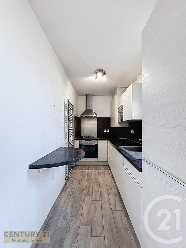 Appartement T3 à louer - 3 pièces - 50.63 m2 - ST GAUDENS - 31 - MIDI-PYRENEES - Century 21 Pyrénées Immo